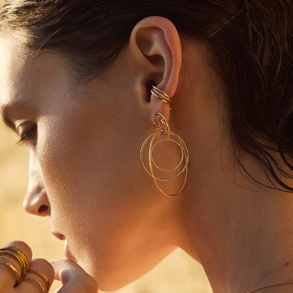 grandes boucles d'oreilles icône