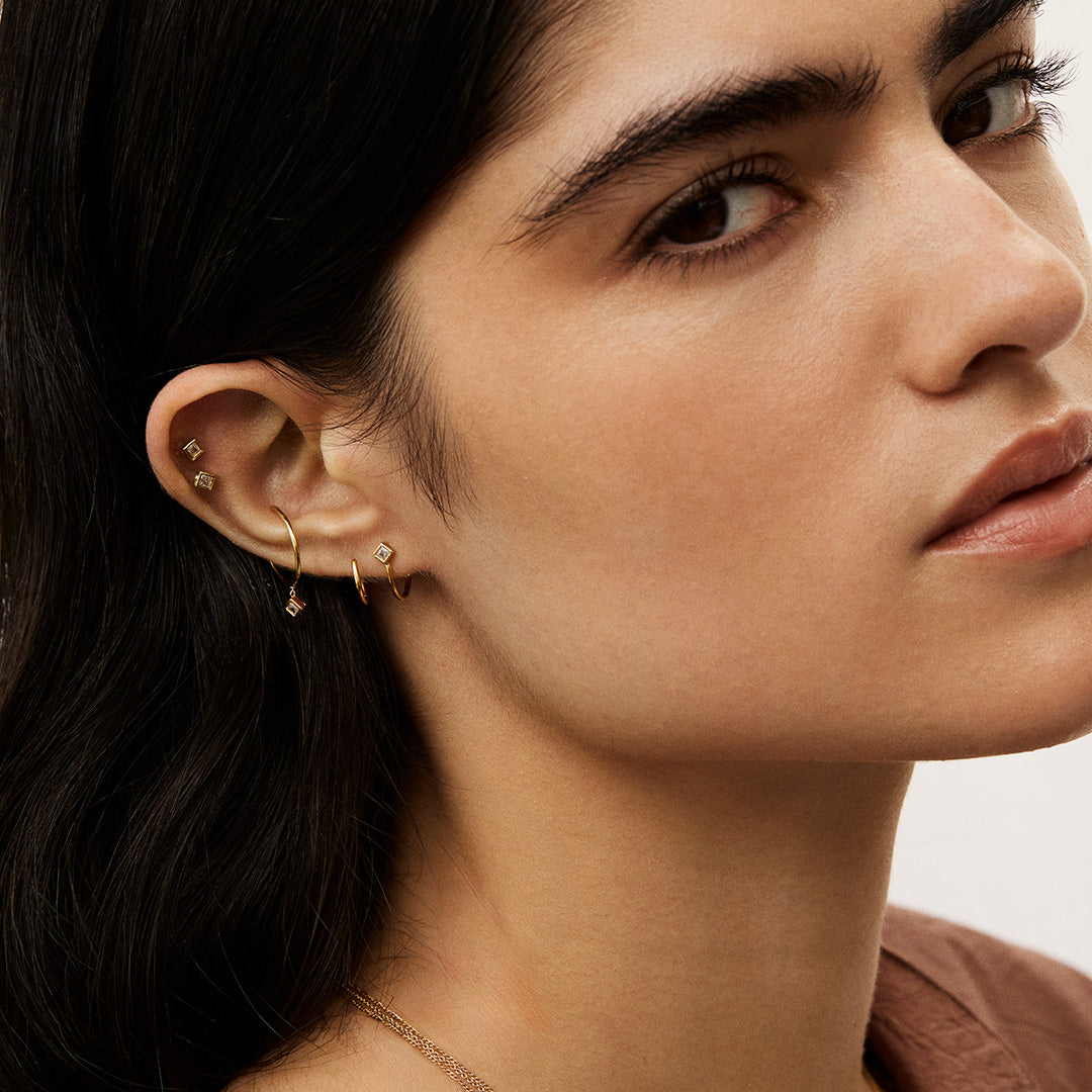 stud earrings Aura